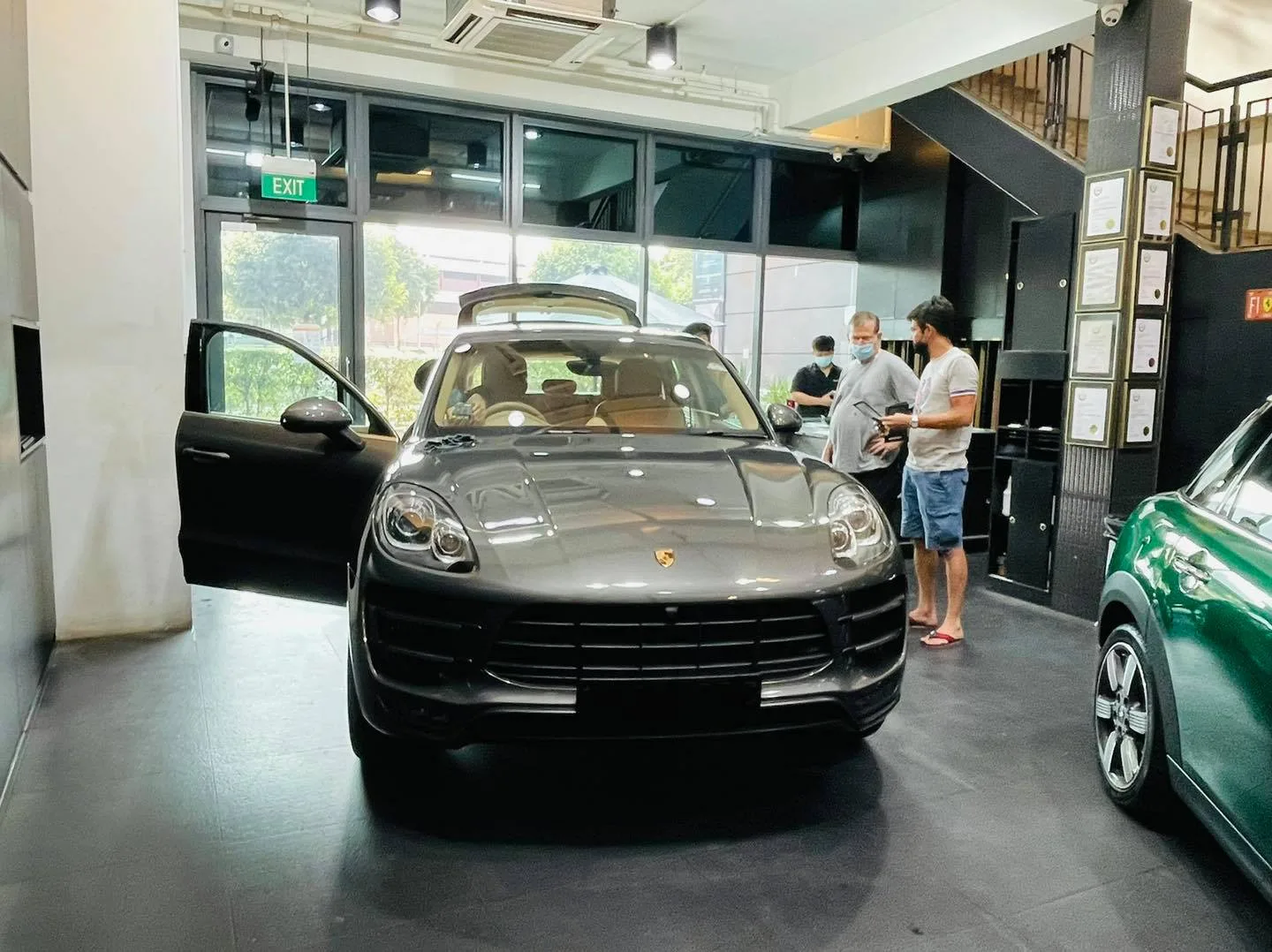 Grey Porsche Macan being prepared for window film at Infratint Singapore