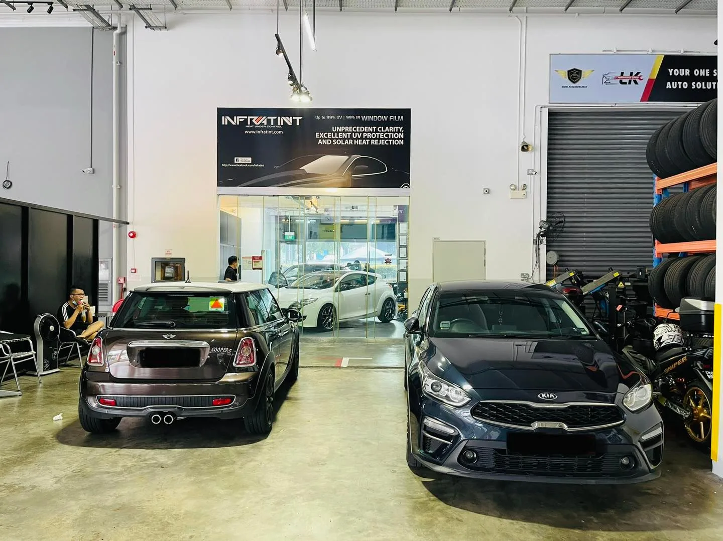 Black Mini and grey Kia at Infratint Singapore for window tinting