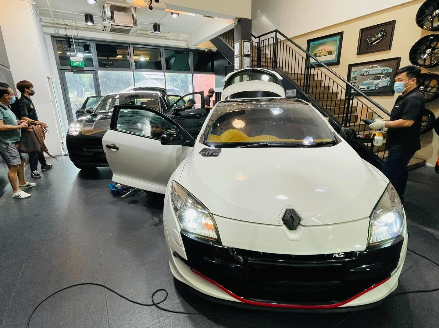 White Renault Megane having window film fitted at Infratint Singapore