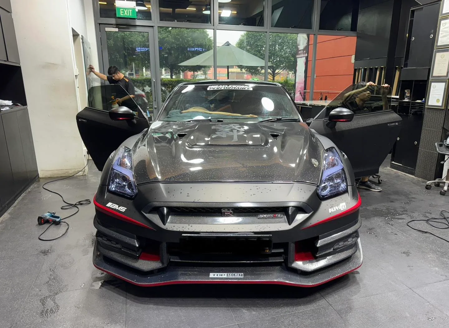 Nissan GT-R front view with doors open during window film install at Infratint Singapore