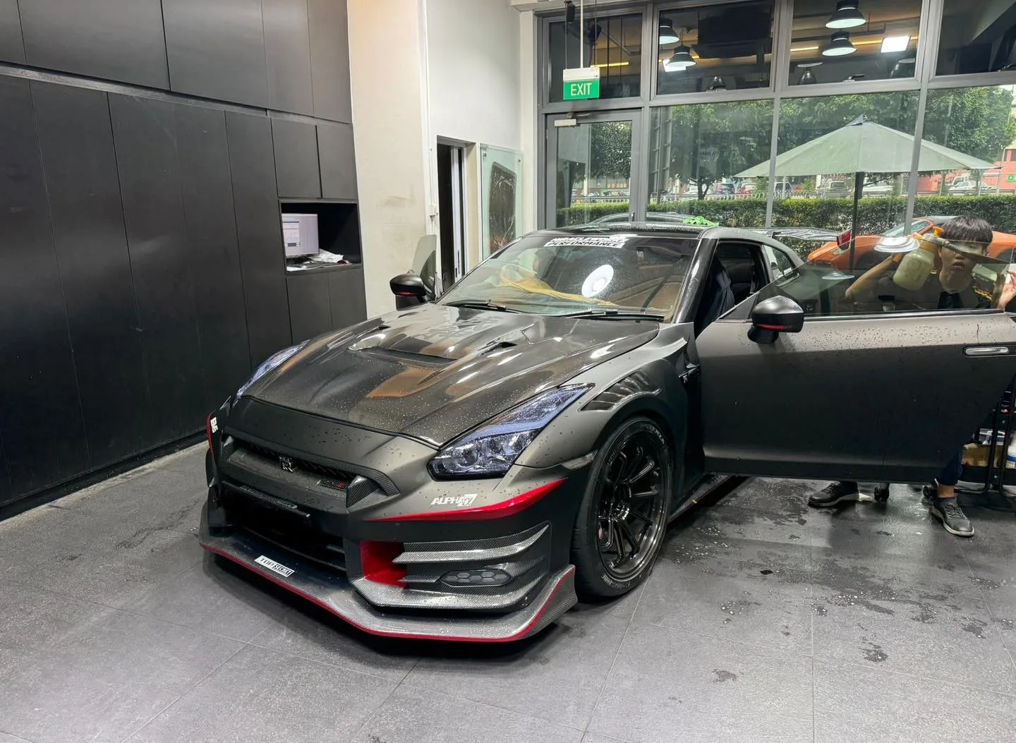 Nissan GT-R front three-quarter view inside the Infratint workshop Singapore