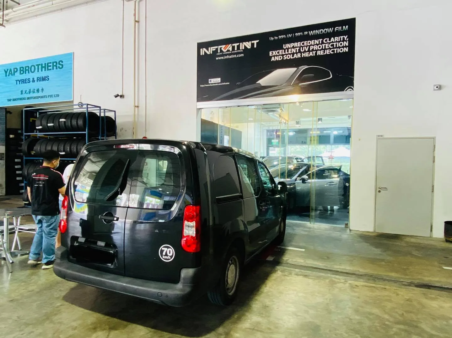 Black Citroen Berlingo van at the Infratint Singapore shopfront for window film