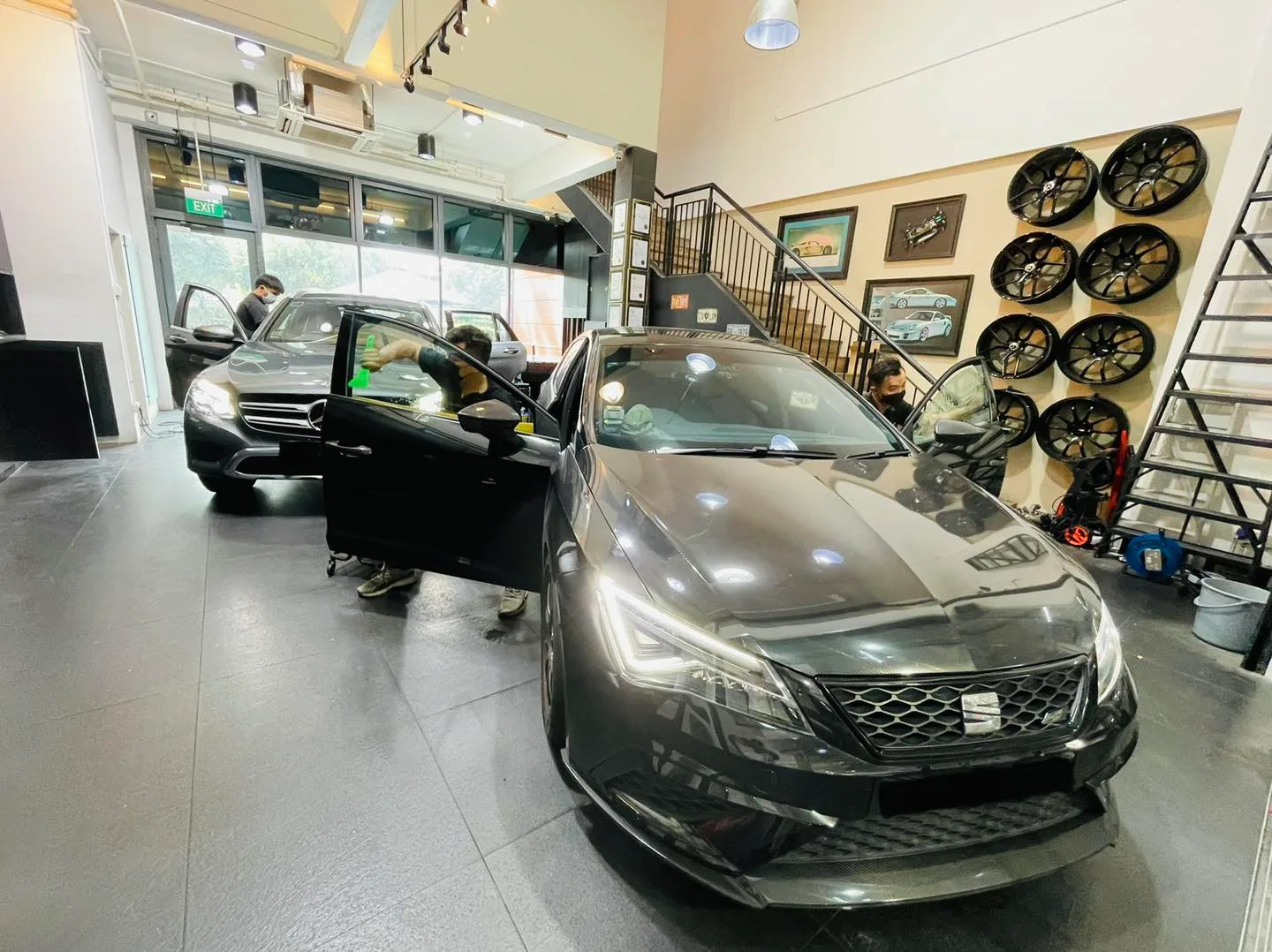 Grey SEAT Leon with open doors at Infratint Singapore for window tinting