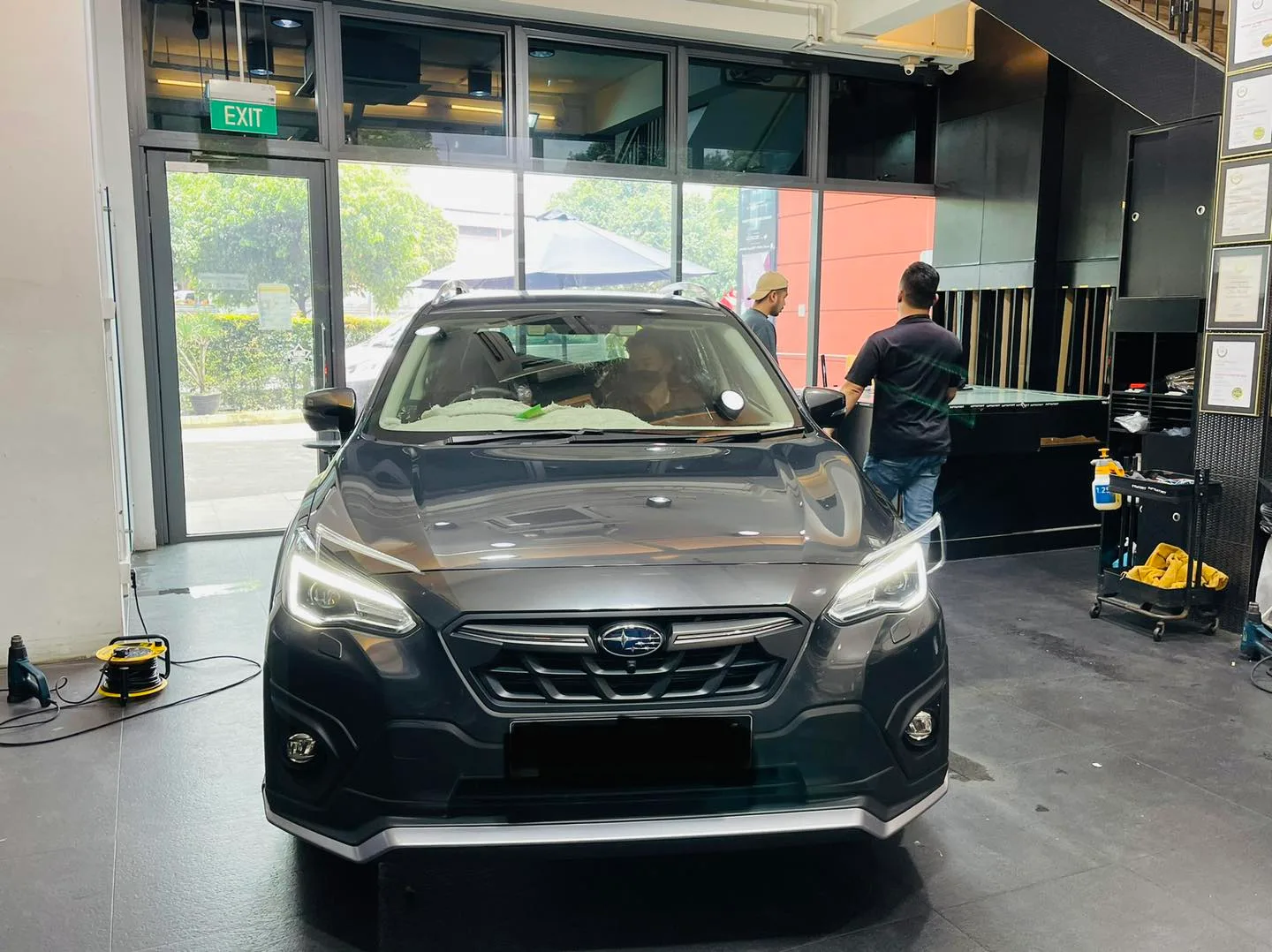 Grey Subaru crossover having windscreen film fitted at Infratint Singapore