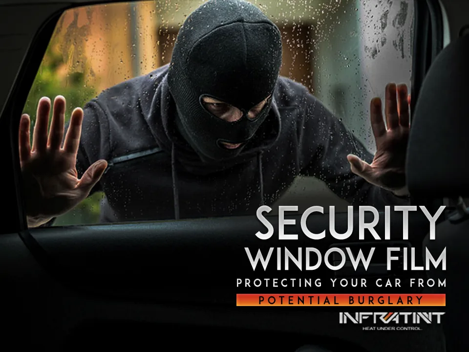Masked person pressing hands against a car window, Infratint security window film article graphic