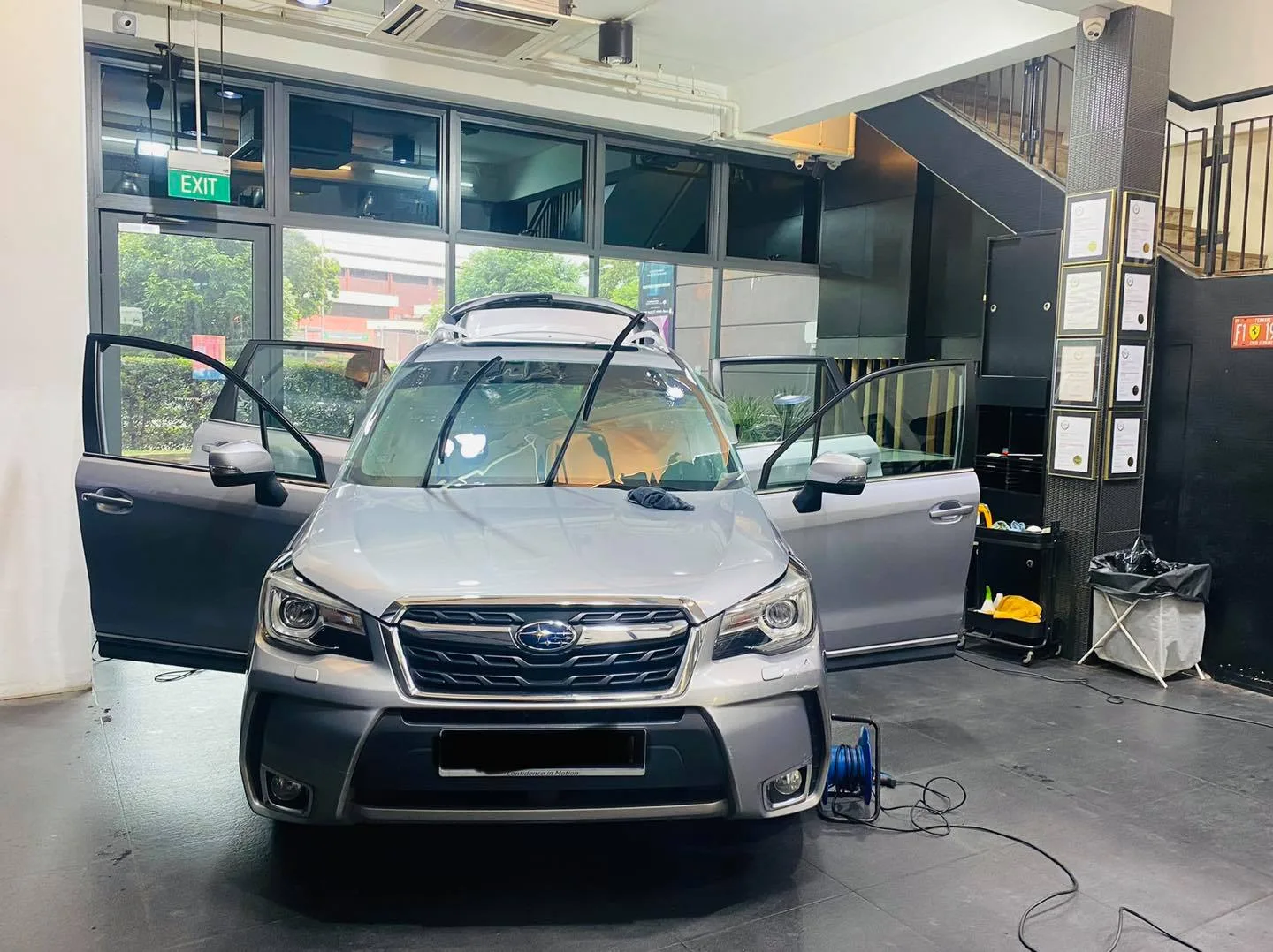 Silver Subaru Forester with doors open at Infratint Singapore for window film