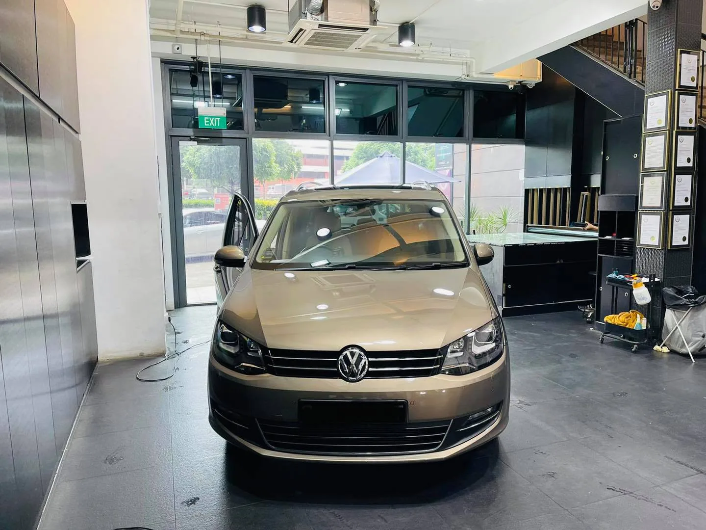 Champagne Volkswagen Sharan MPV in the showroom at Infratint Singapore