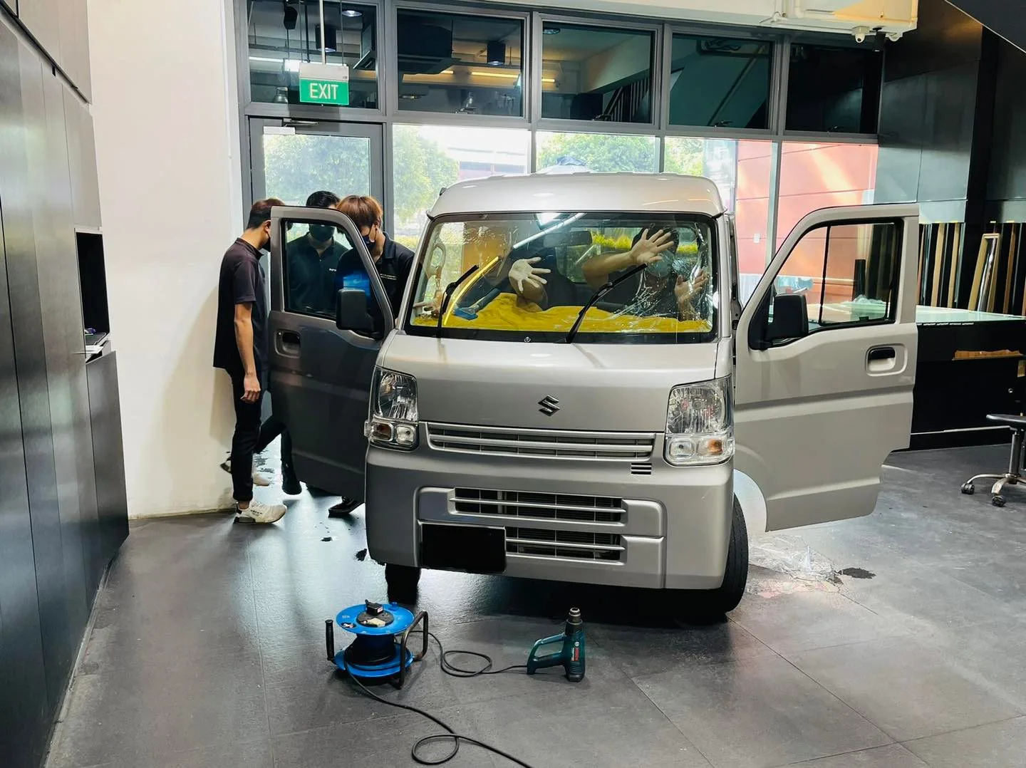 Silver Suzuki Every kei van with doors open at Infratint Singapore for window tinting