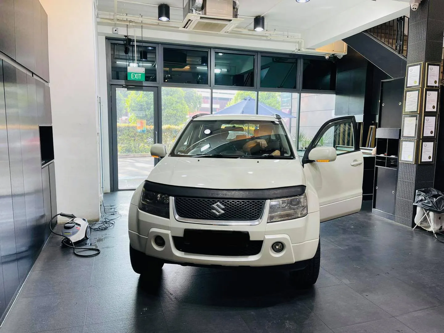 White Suzuki Grand Vitara front view with open door at Infratint Singapore