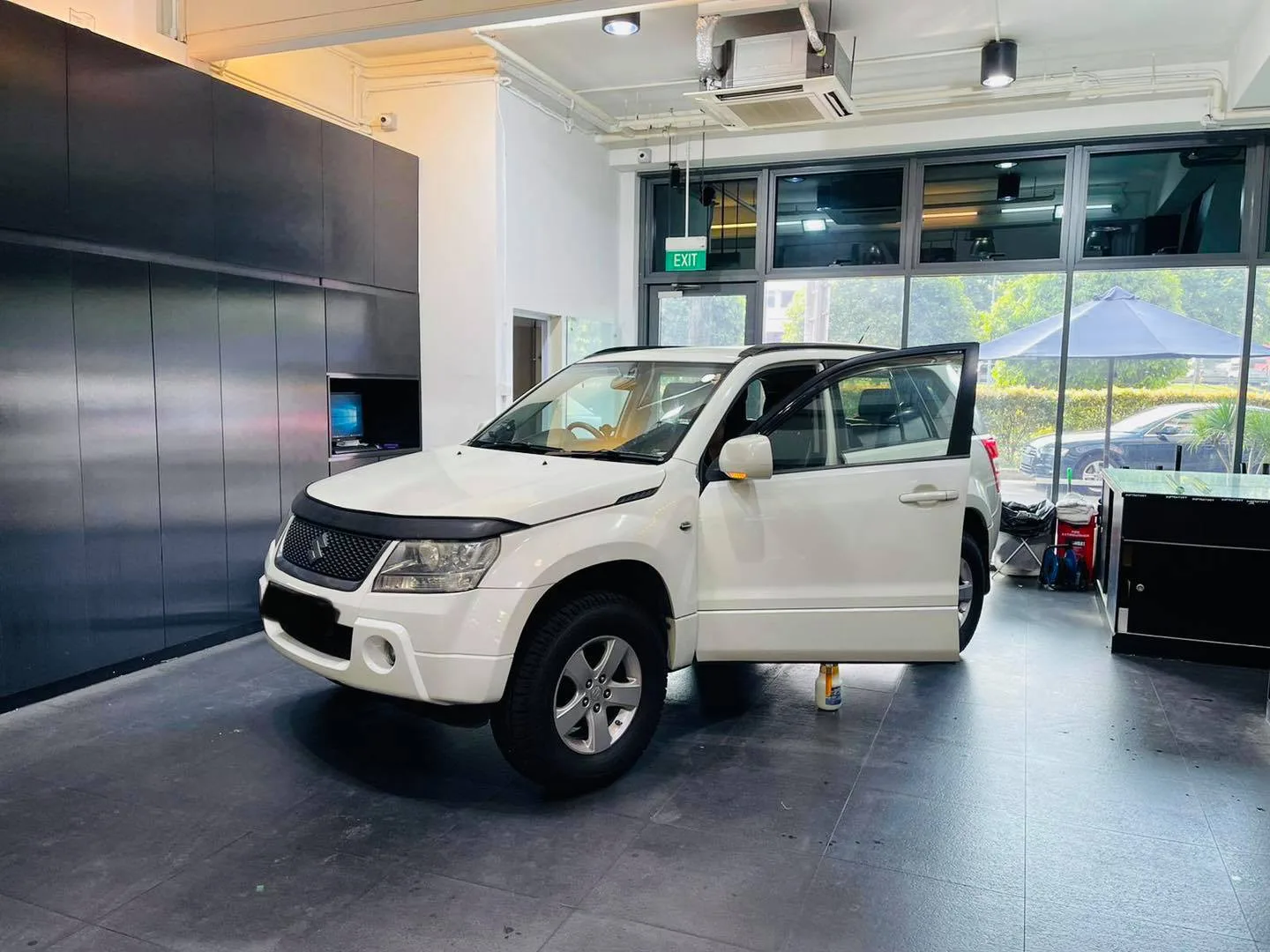 White Suzuki Grand Vitara front three-quarter at Infratint Singapore