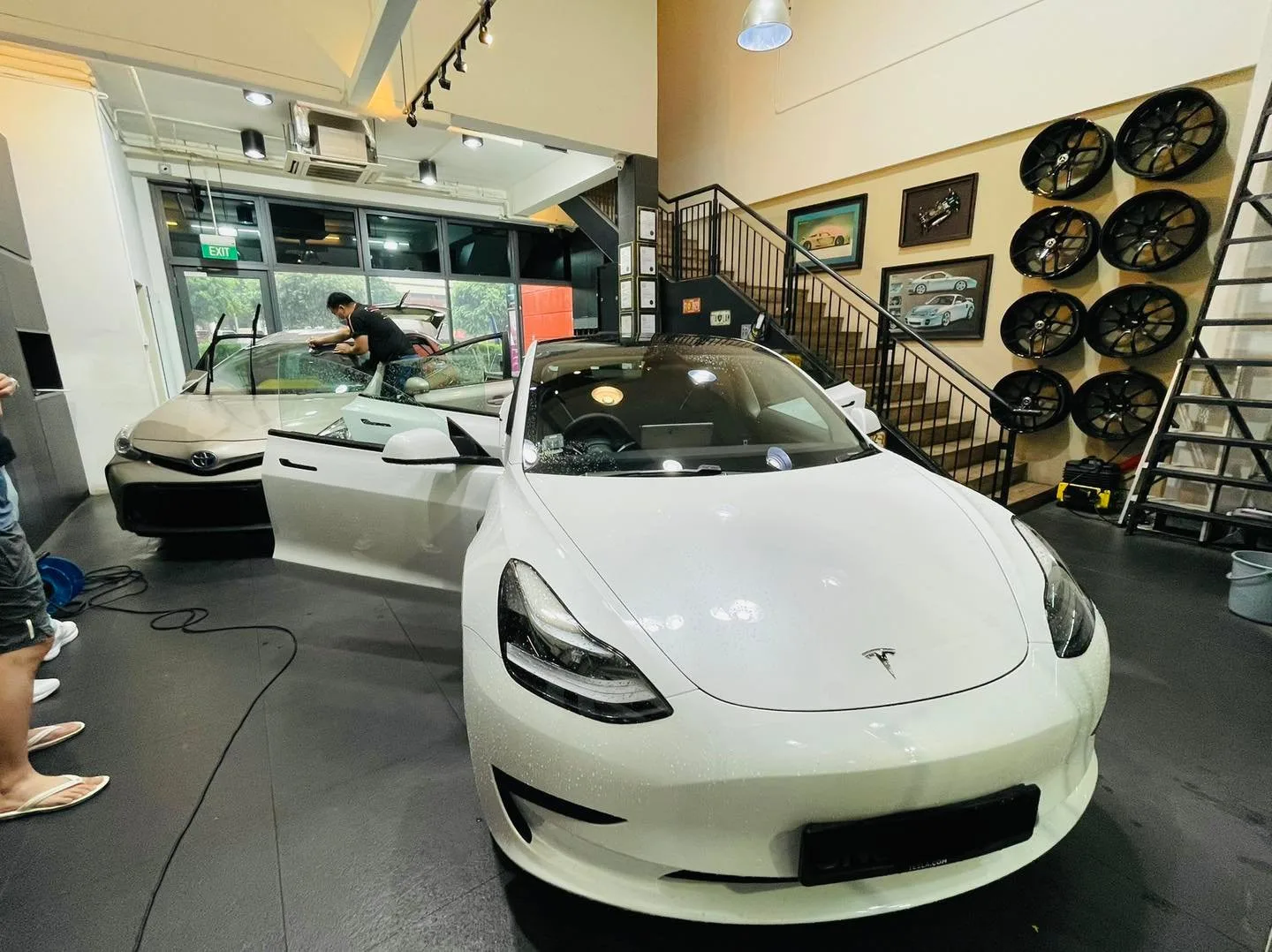 White Tesla Model 3 having its windscreen tinted at Infratint Singapore