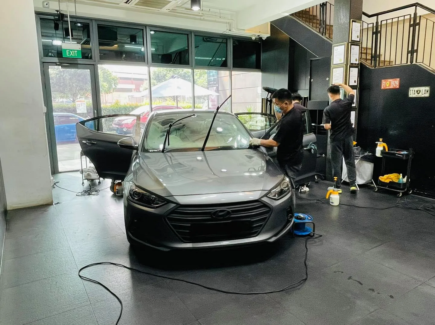 Grey Hyundai Elantra having its windscreen tinted at Infratint Singapore