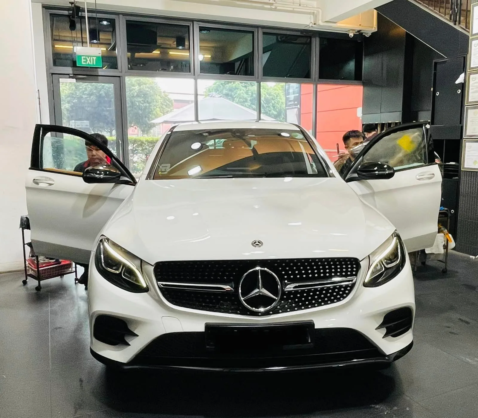 White Mercedes-Benz GLC with doors open at Infratint Singapore for window film