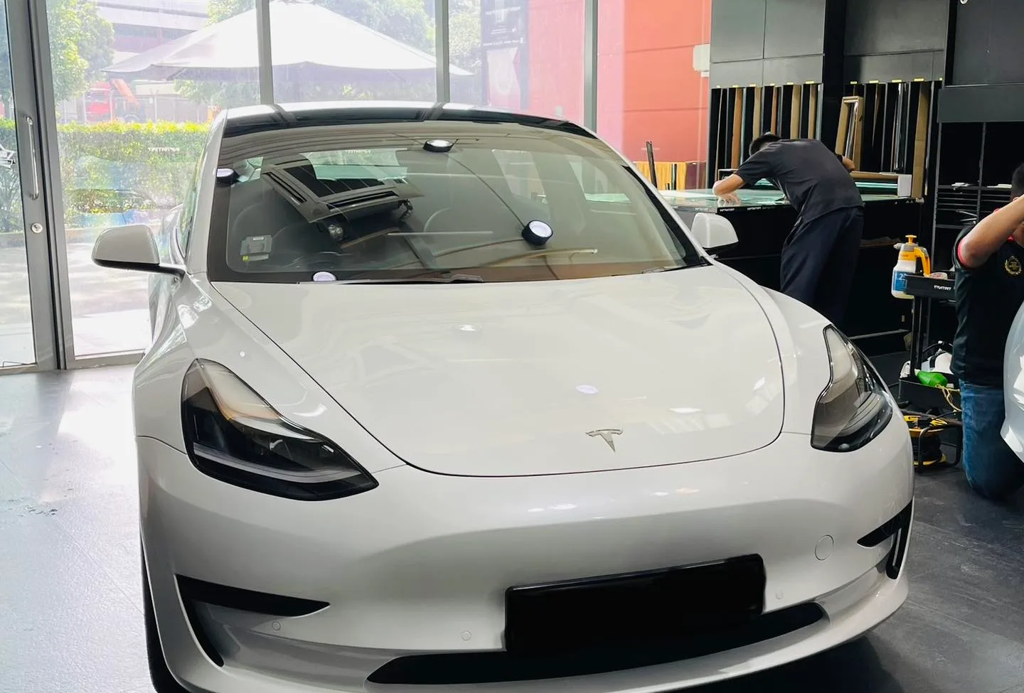 White Tesla Model 3 at Infratint Singapore for window tinting