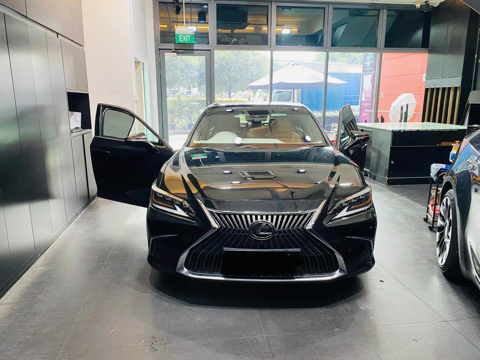 Black Lexus ES front view with open door at Infratint Singapore