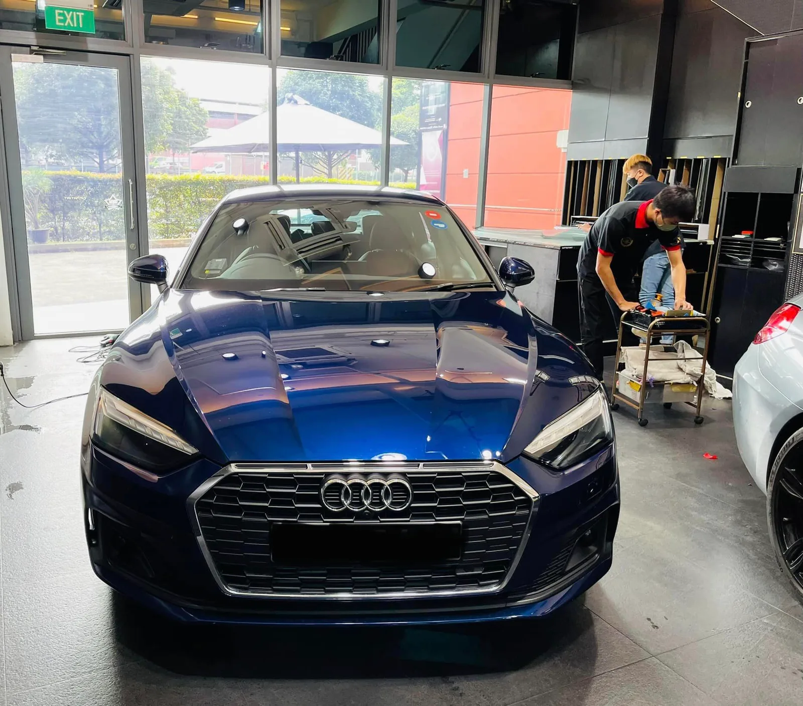 Blue Audi A5 having window film fitted at Infratint Singapore