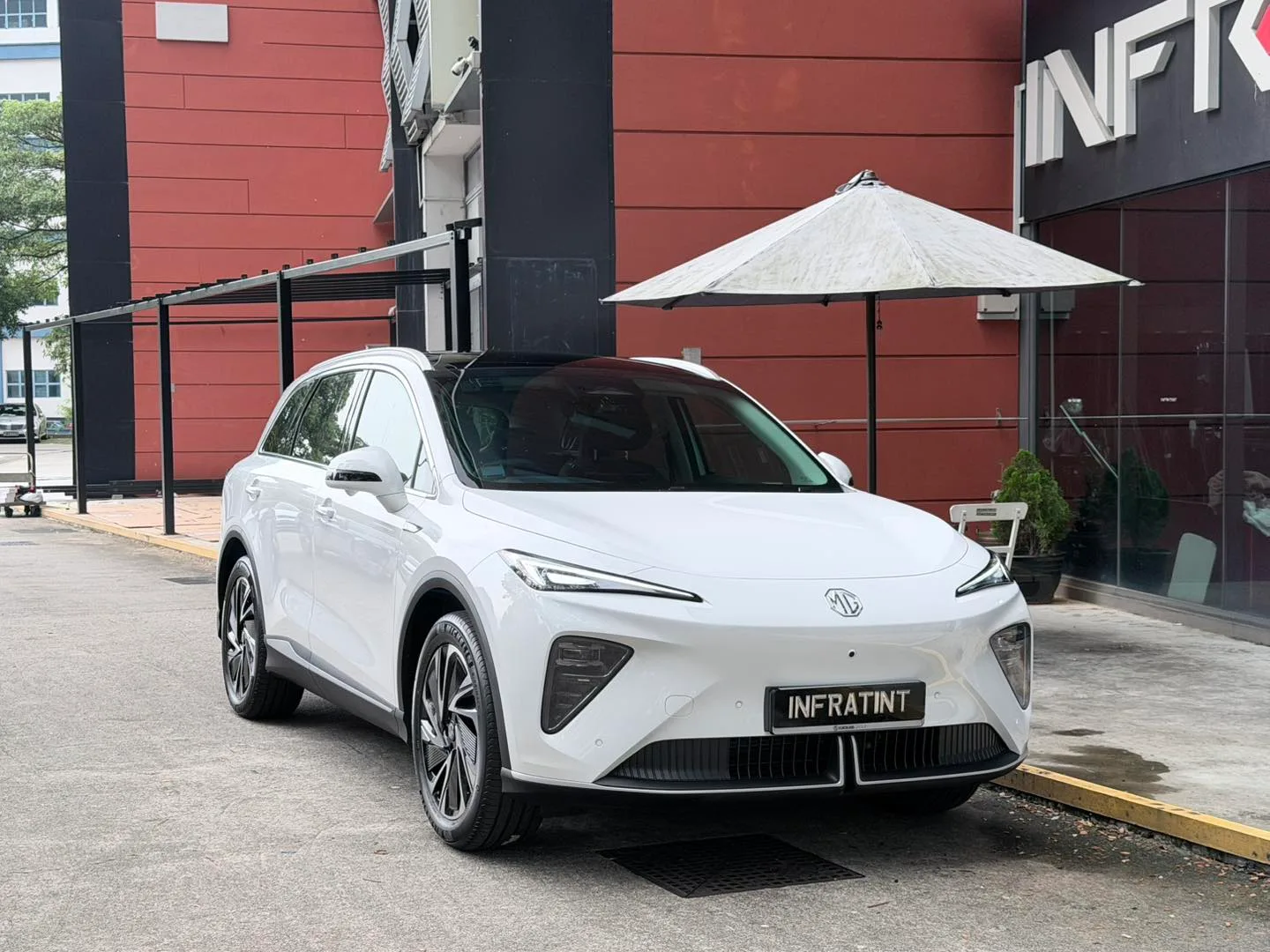 White MG S6 EV front three-quarter view outside Infratint Singapore
