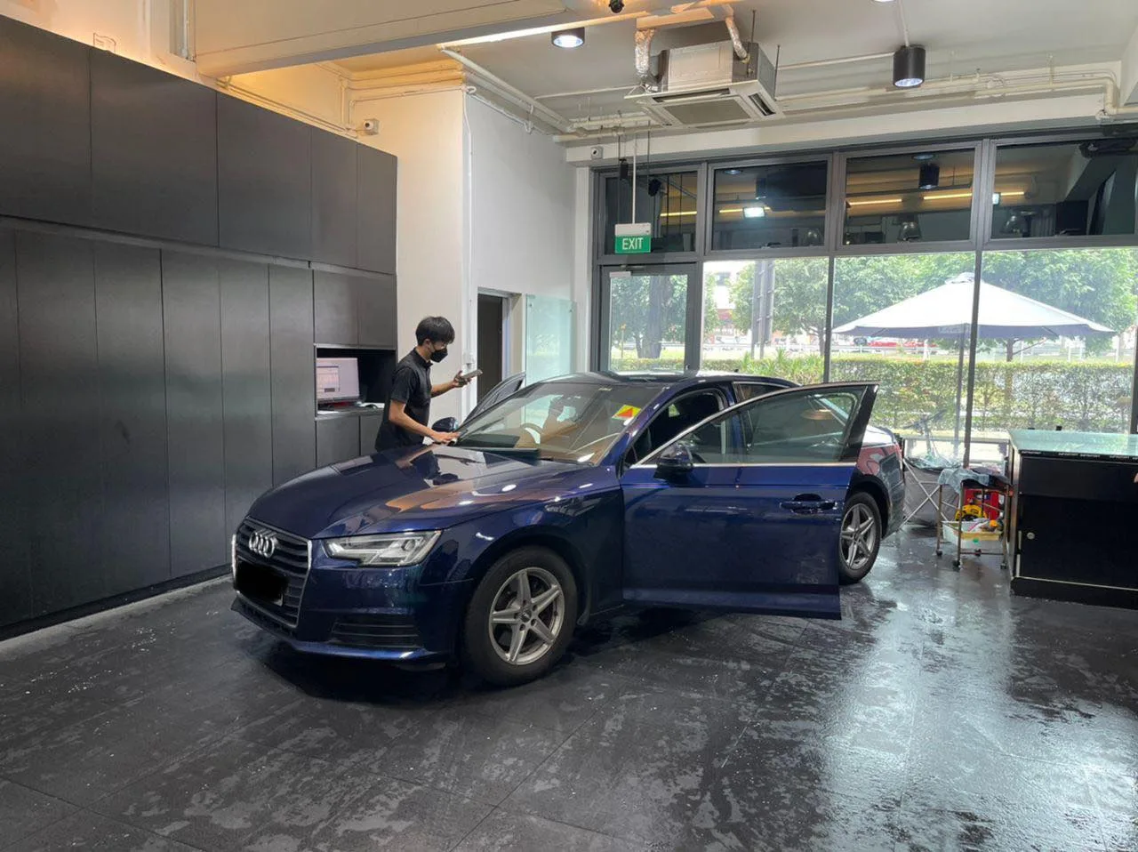 Dark blue Audi A4 having windscreen film fitted at Infratint Singapore