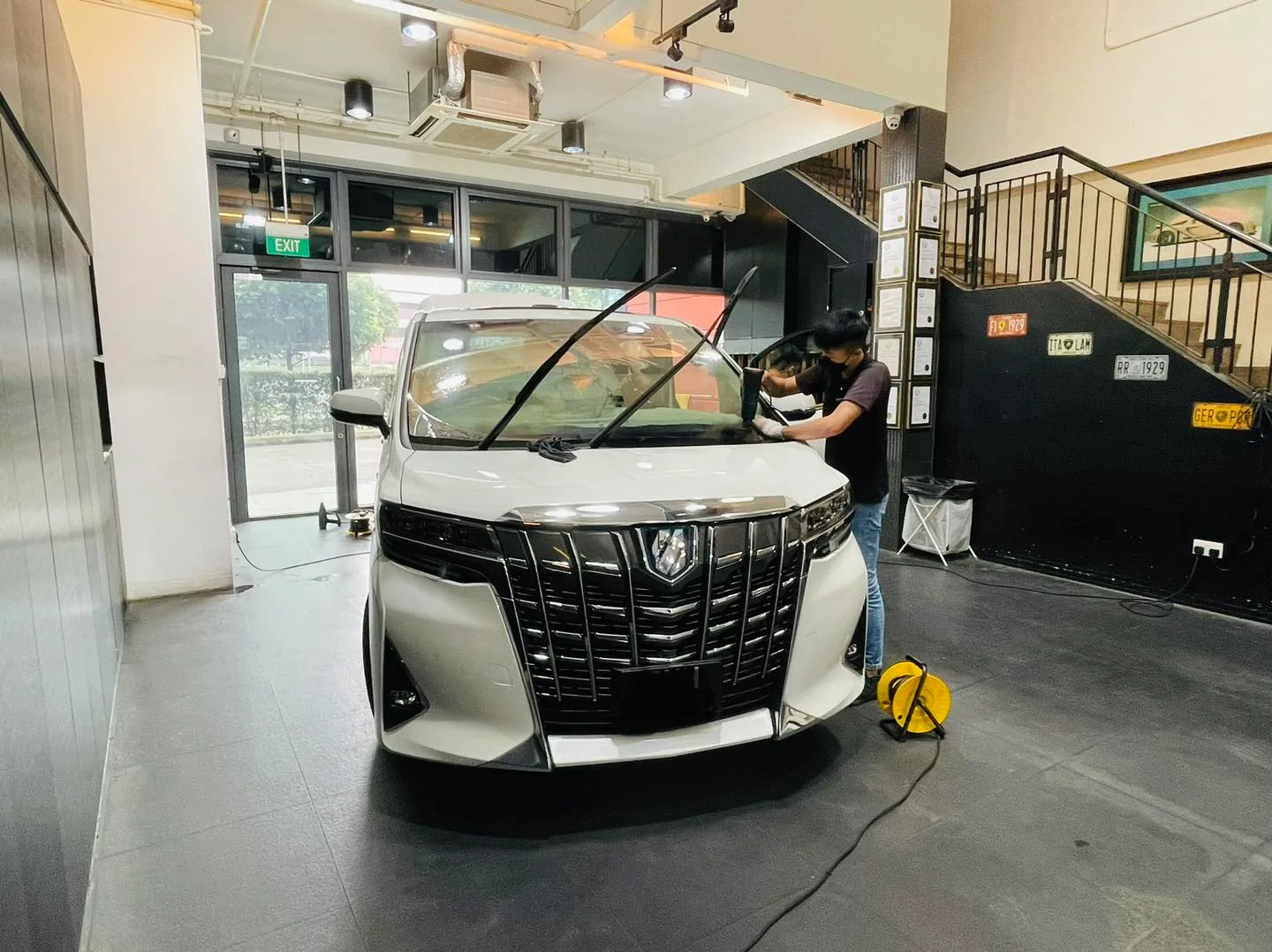White Toyota Alphard MPV having its windscreen tinted at Infratint Singapore
