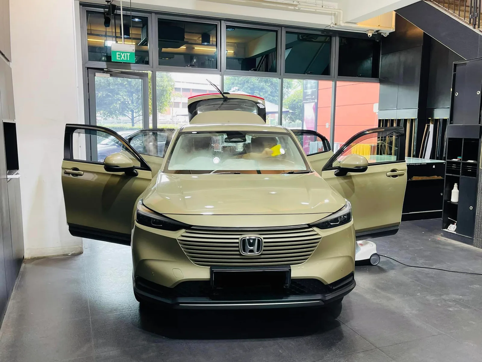 Sand Honda HR-V with doors and tailgate open at Infratint Singapore