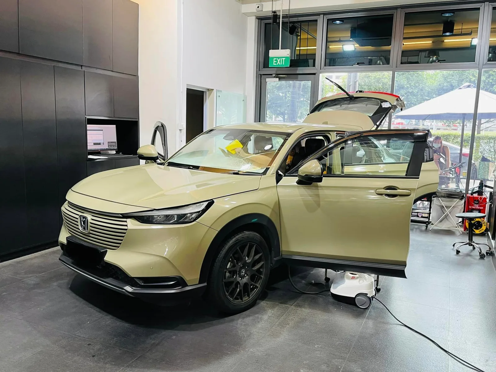 Sand Honda HR-V front three-quarter during window tinting at Infratint Singapore