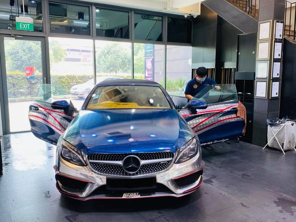 Blue and chrome wrapped Mercedes-Benz C-Class coupe having window film fitted at Infratint Singapore