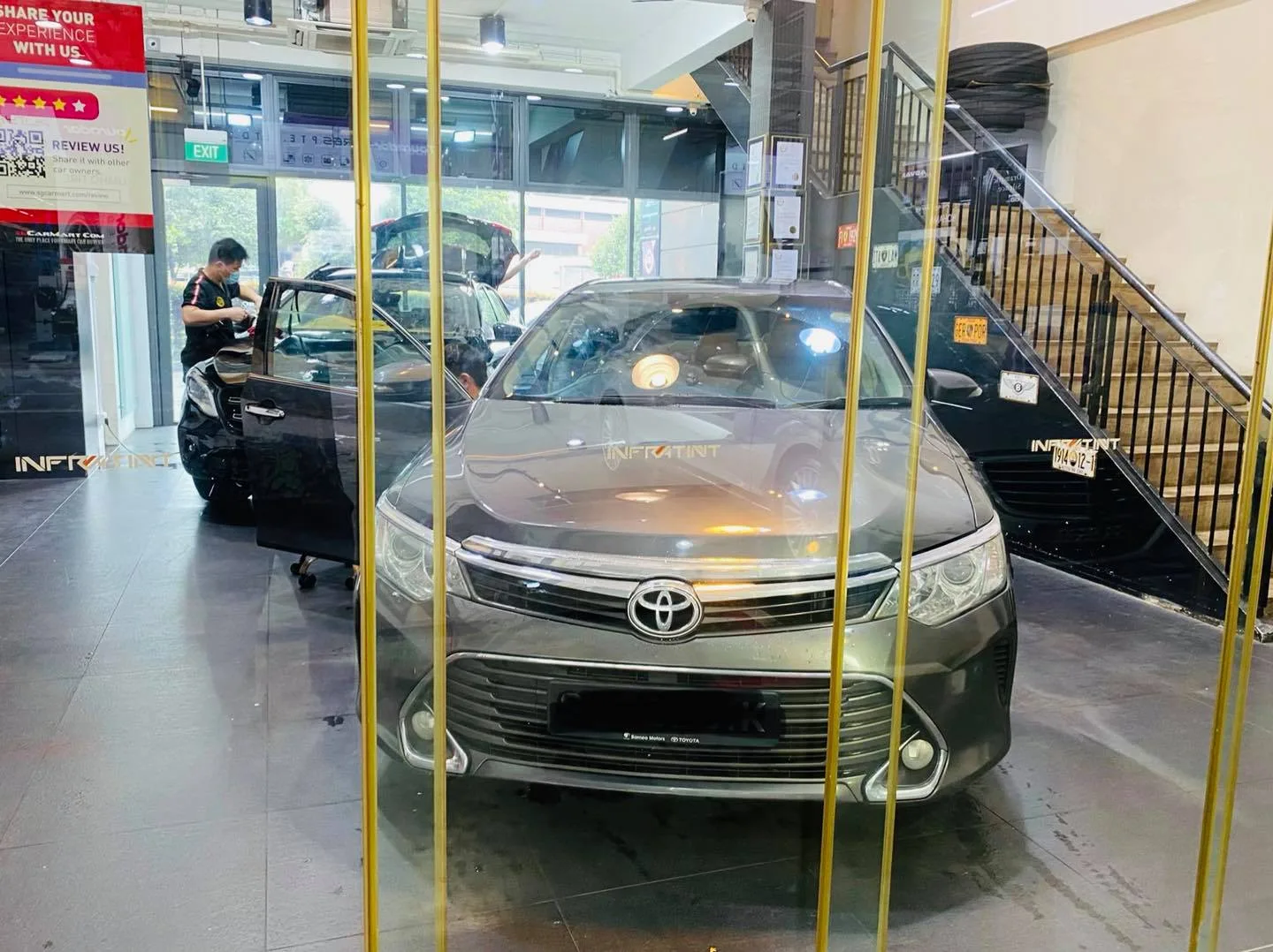 Bronze Toyota Camry in the Infratint Singapore showroom for window tinting