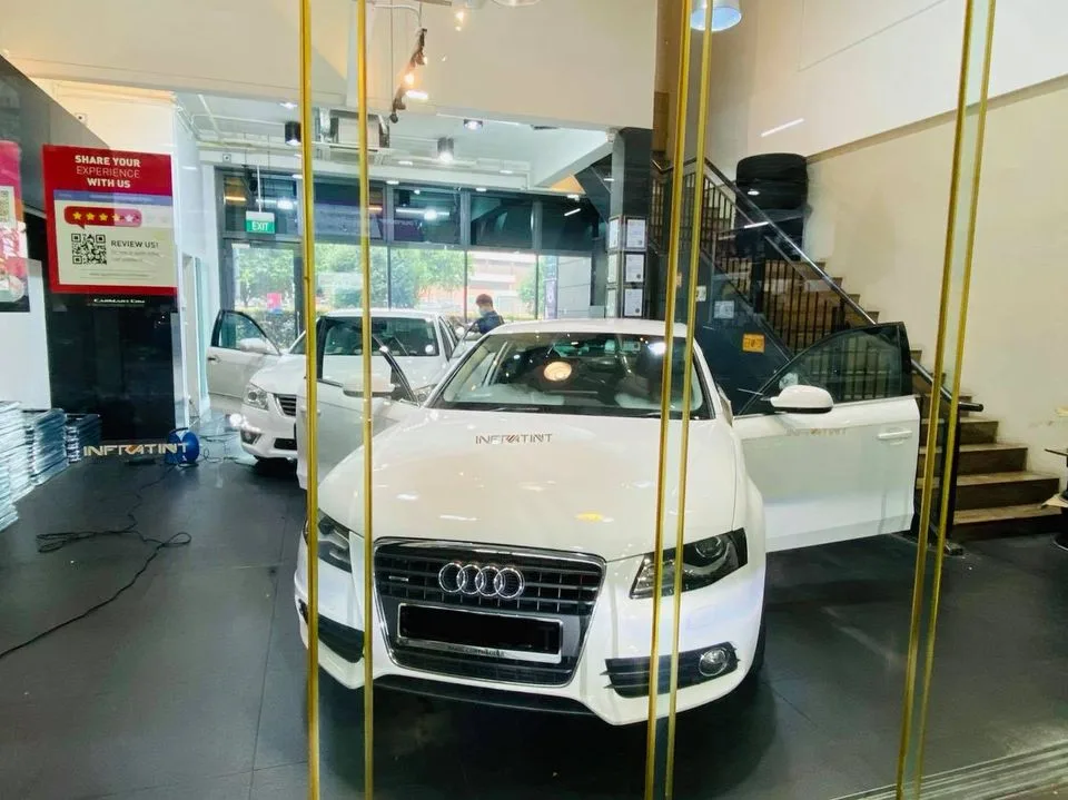 White Audi A5 in the Infratint Singapore showroom for window film installation