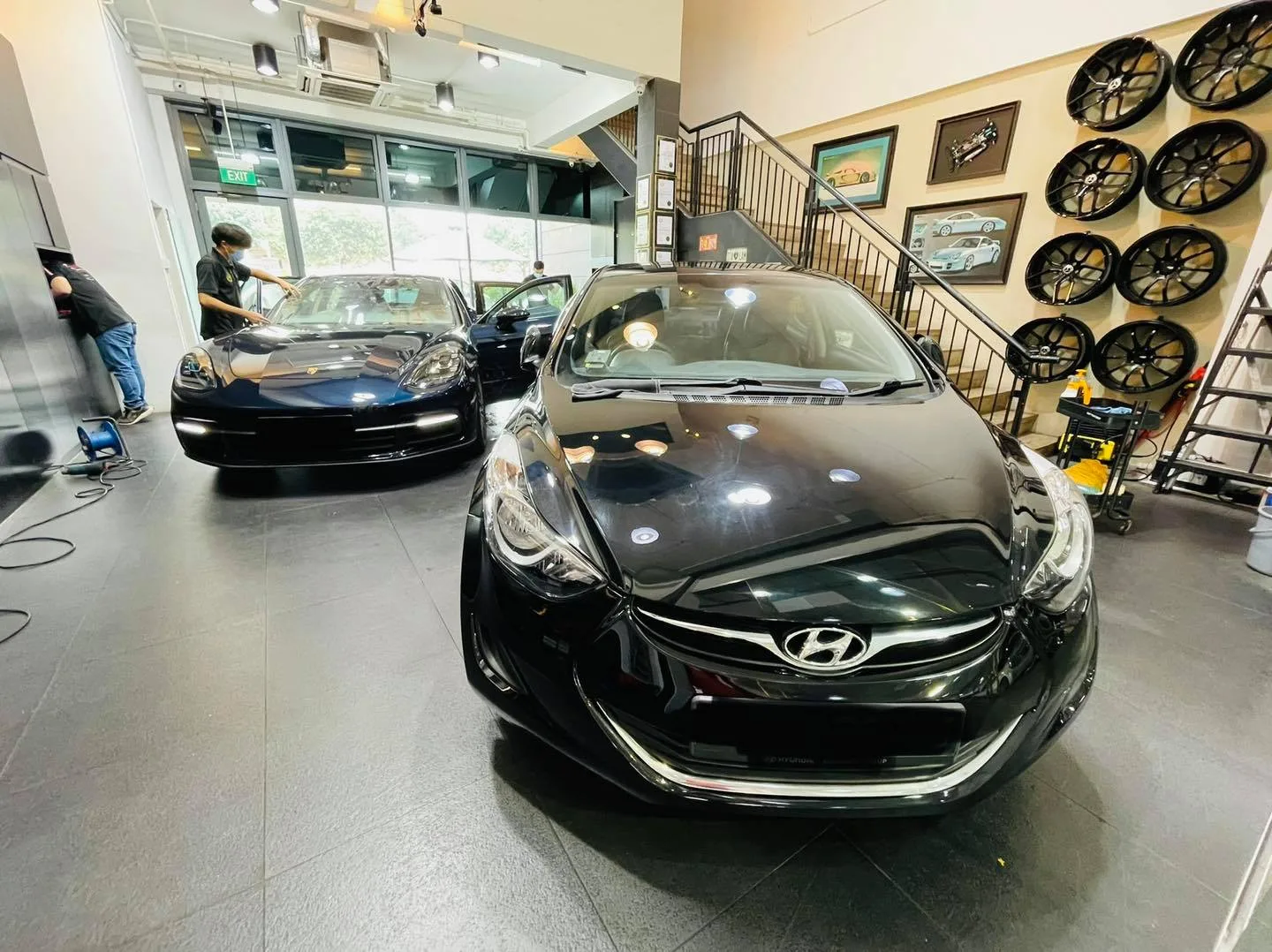 Black Hyundai sedan front view in the install bay at Infratint Singapore