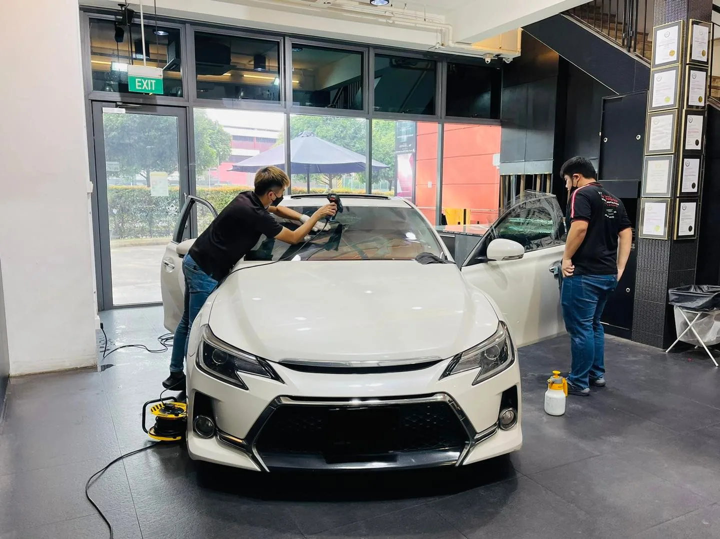 White Toyota Mark X having windscreen film fitted at Infratint Singapore