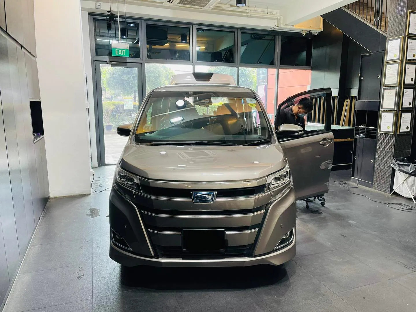Champagne Toyota Noah MPV having windows tinted at Infratint Singapore