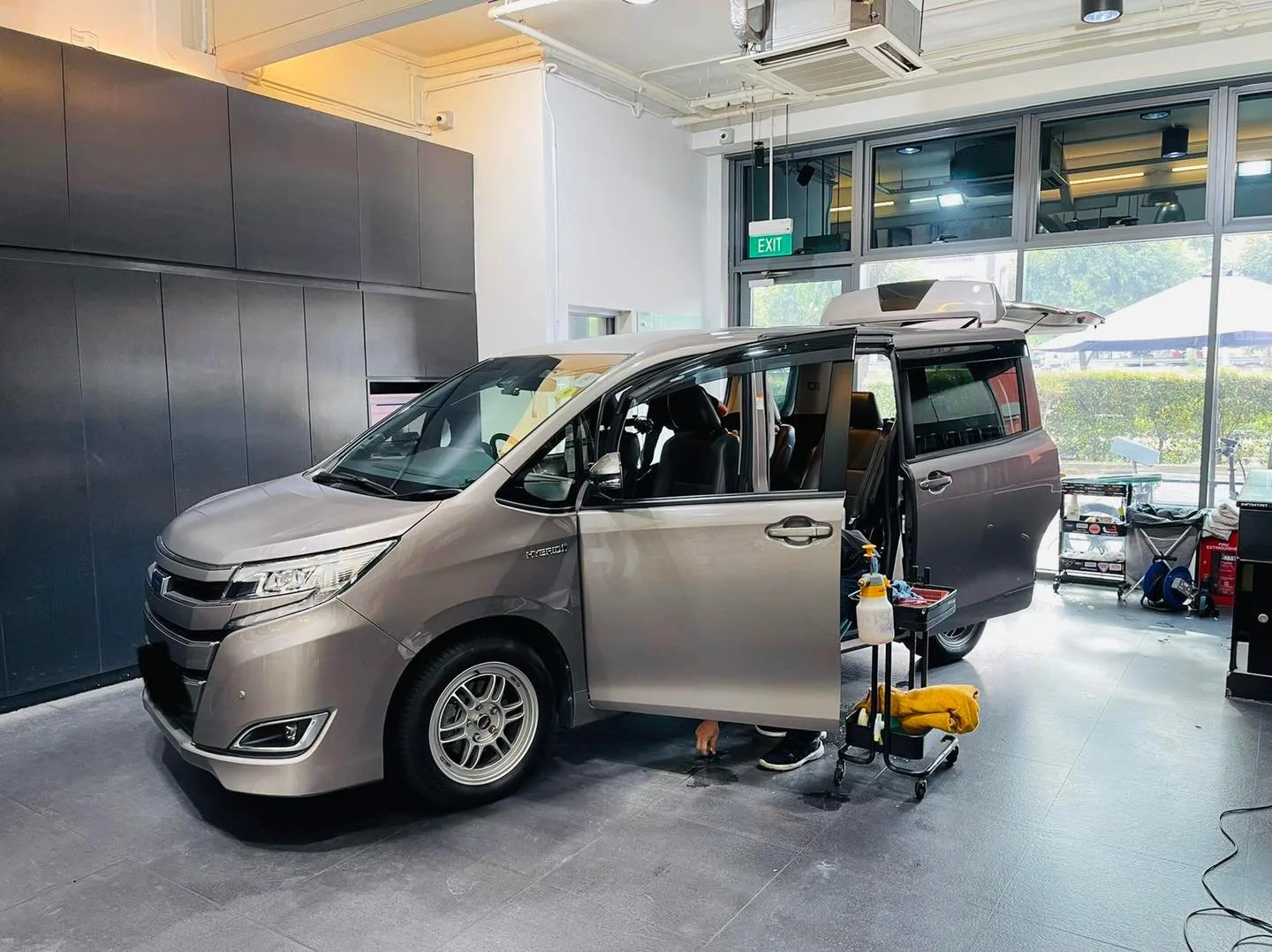 Champagne Toyota Noah MPV during window film installation at Infratint Singapore