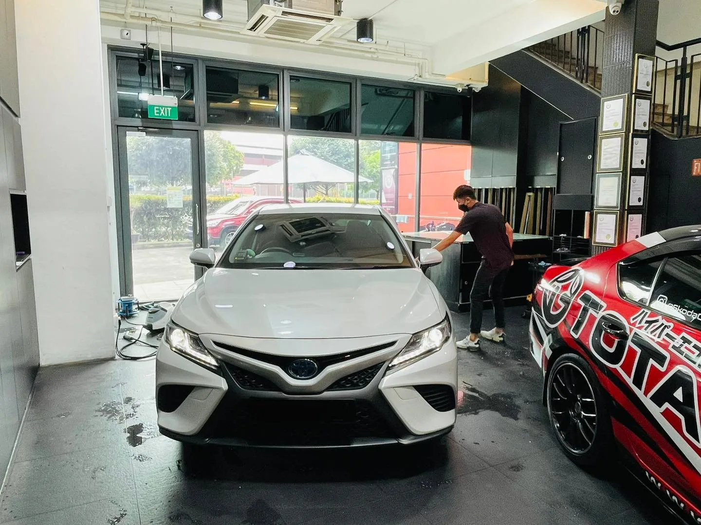White Toyota Camry having its windows tinted at Infratint Singapore