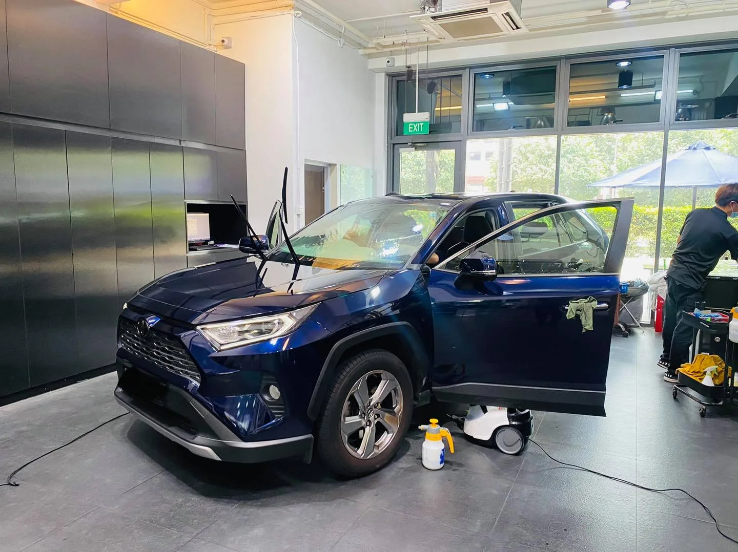 Dark blue Toyota RAV4 front three-quarter view at Infratint Singapore window tinting