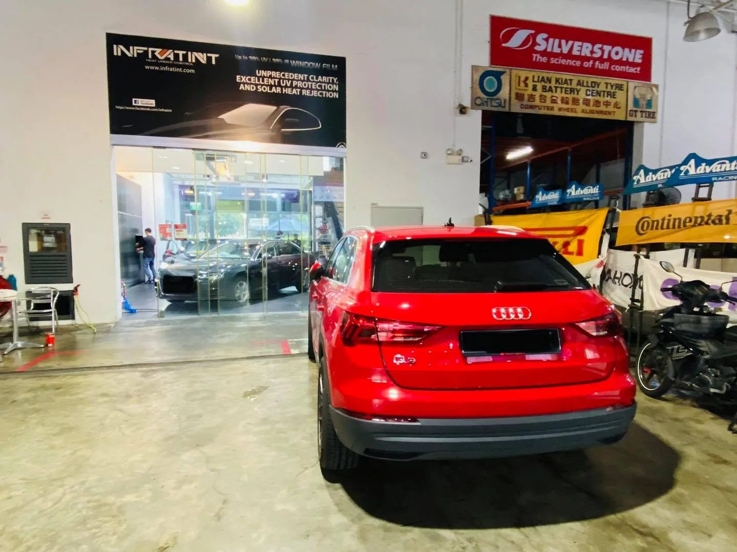 Red Audi Q3 rear view at Infratint Singapore for window film installation