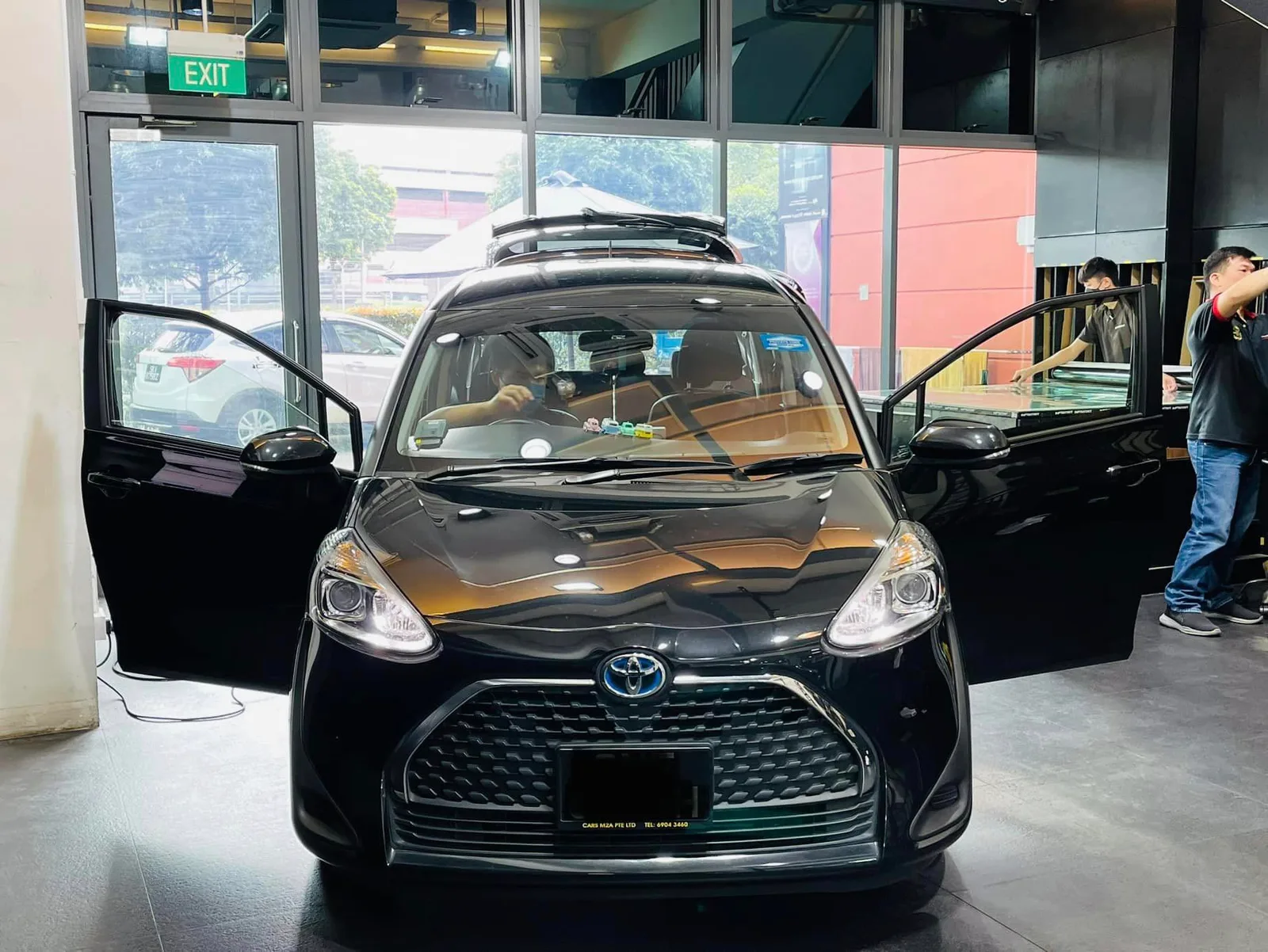 Black Toyota compact MPV having its windows tinted at Infratint Singapore