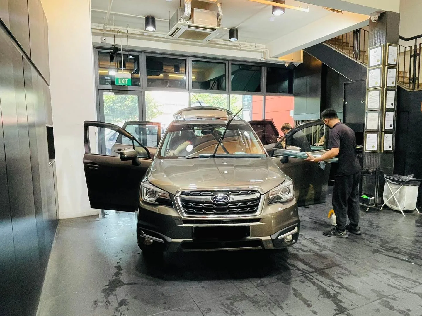 Bronze Subaru Forester having its windscreen tinted at Infratint Singapore
