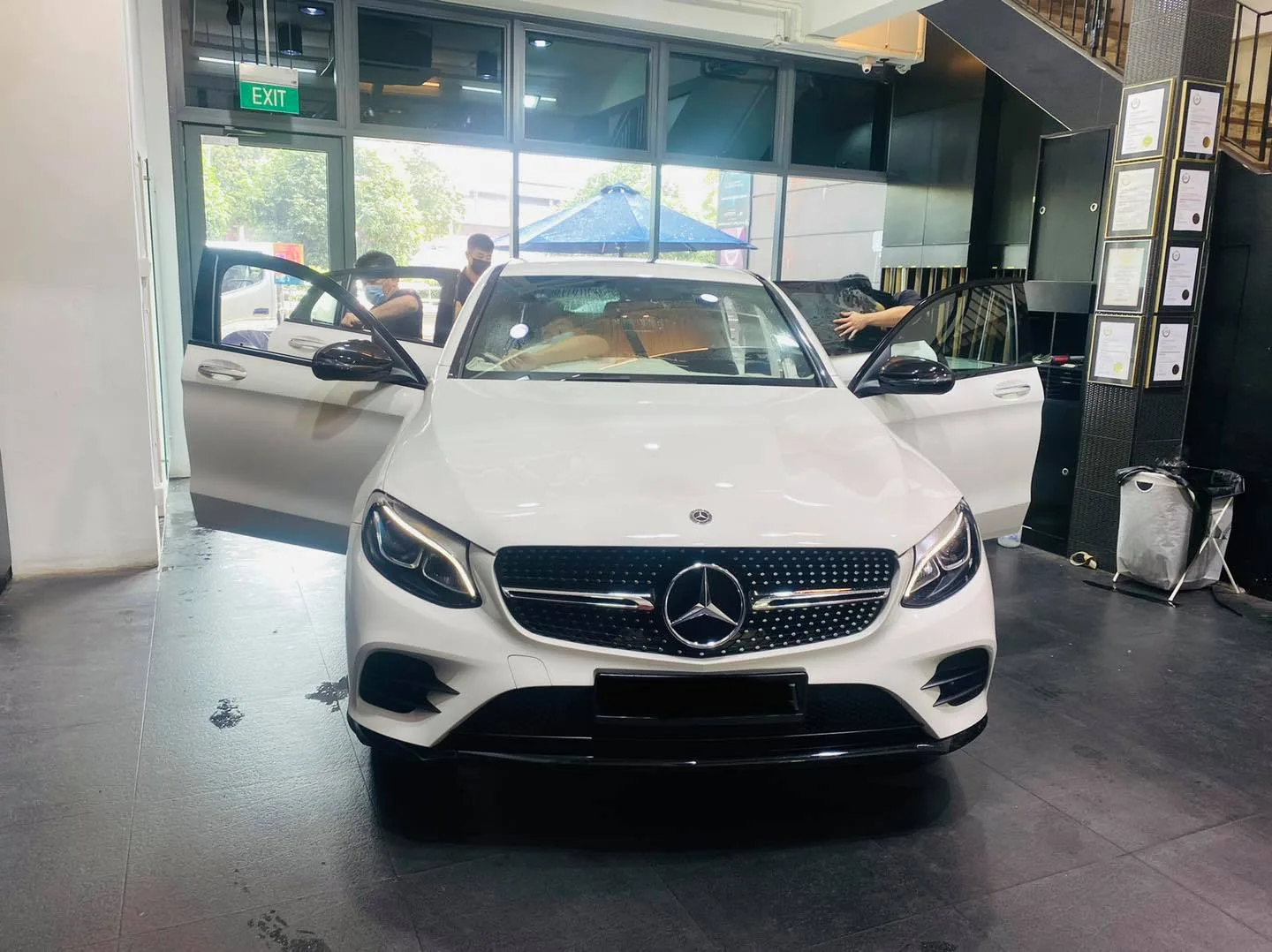 White Mercedes-Benz GLC SUV at Infratint Singapore for window tinting