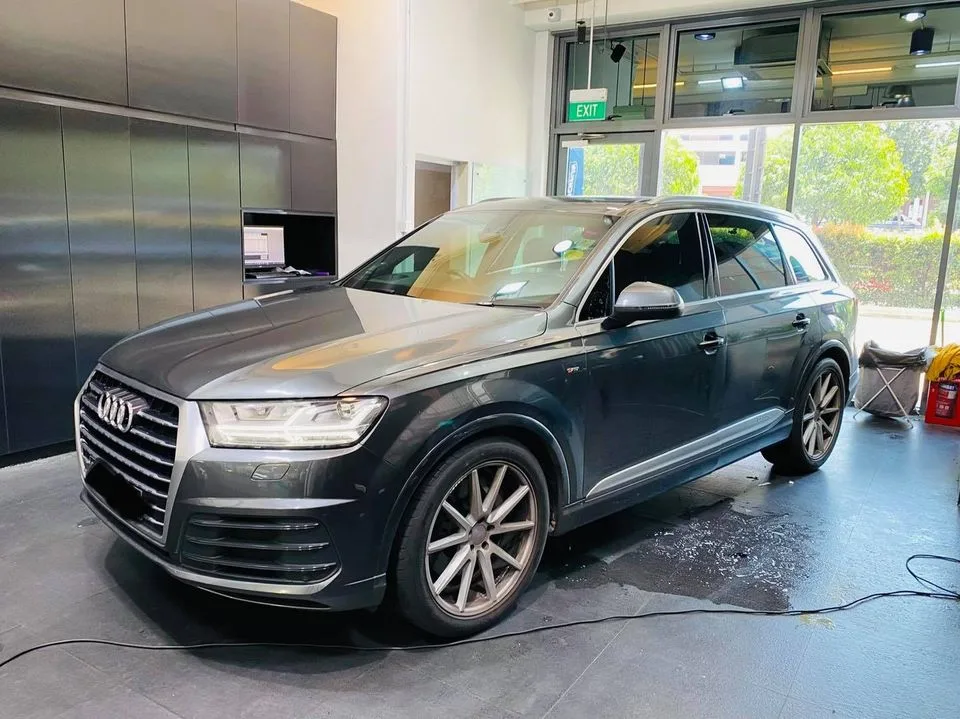 Grey Audi Q7 SUV side profile after window tinting at Infratint Singapore