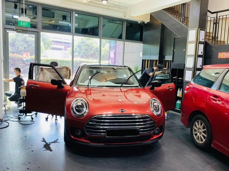 Red Mini Cooper having its windows tinted at Infratint Singapore