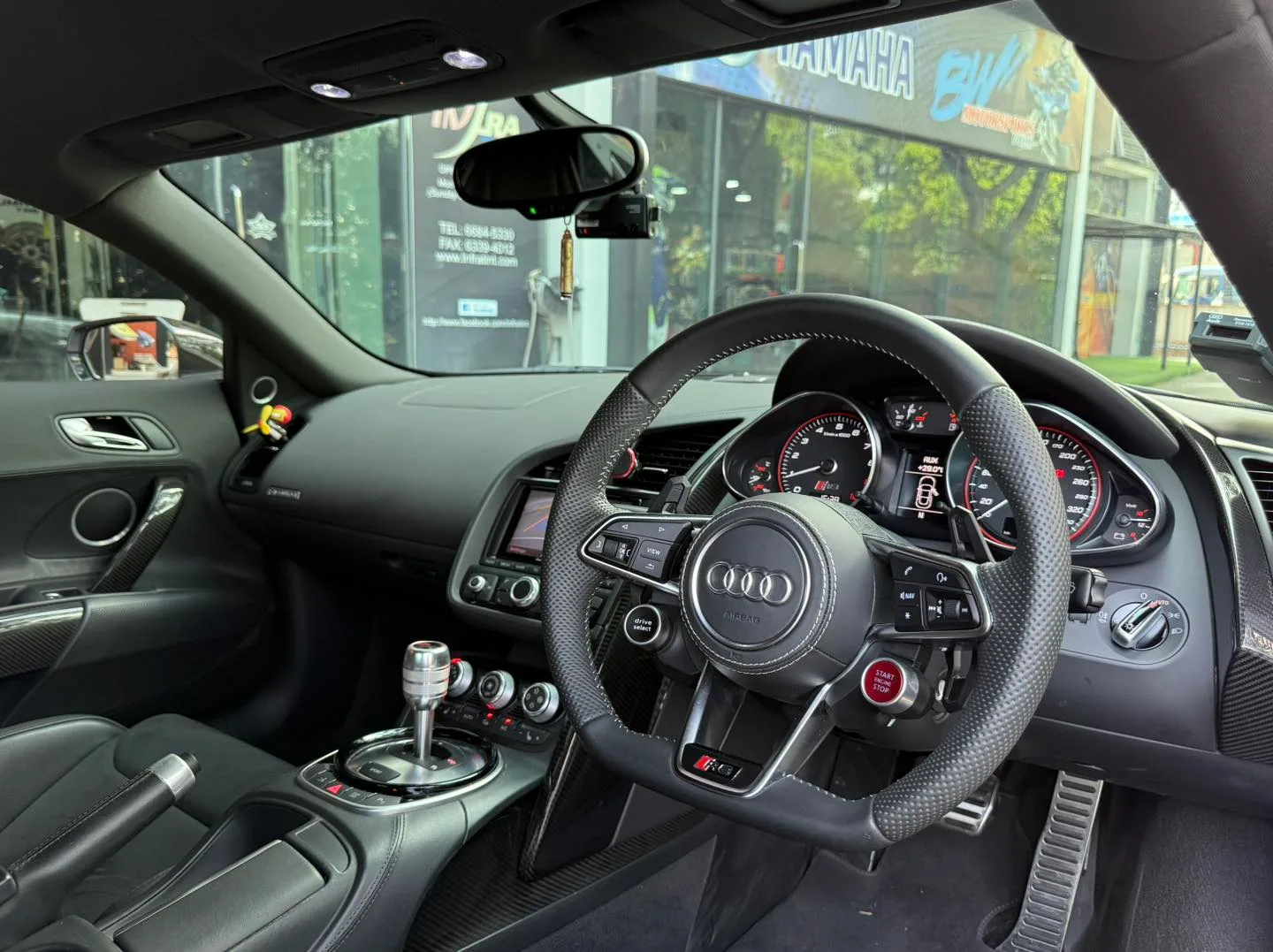 Audi R8 black interior seen through tinted windscreen at Infratint Singapore