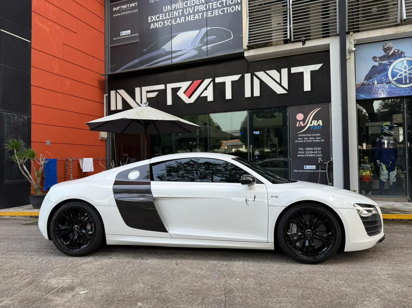 White Audi R8 side profile outside Infratint Singapore