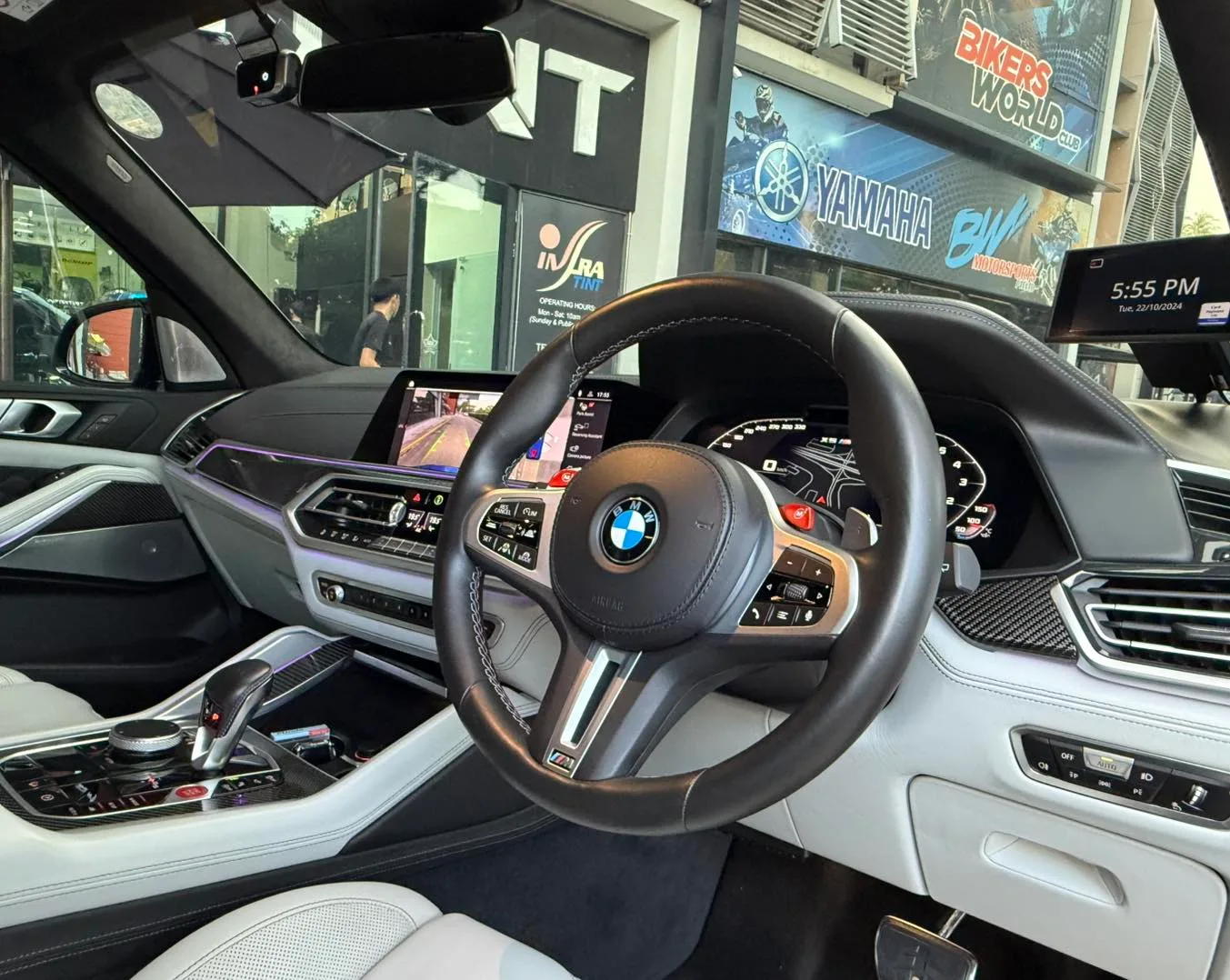 BMW X5 M steering wheel and white leather interior at Infratint Singapore