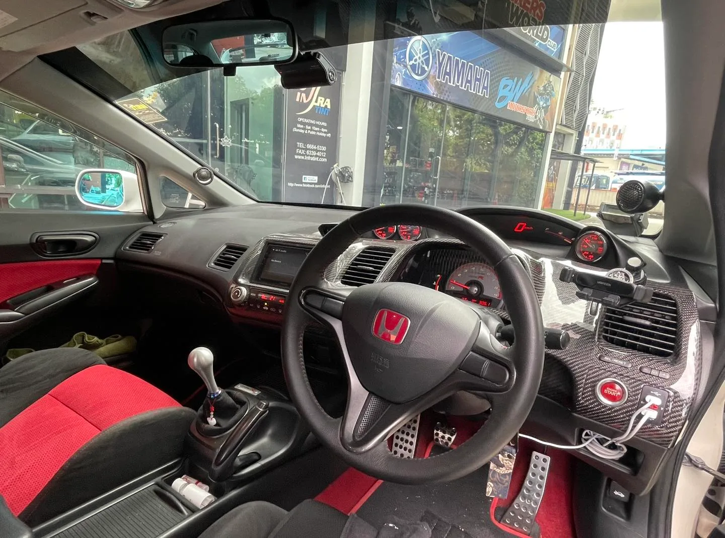 Honda Civic Type R red and black interior seen through tinted windscreen at Infratint Singapore