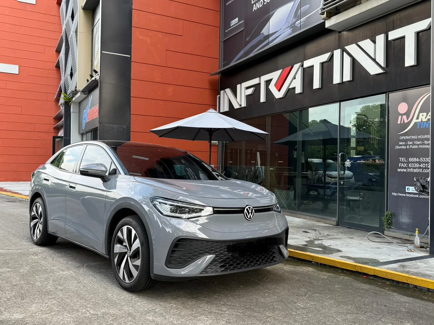 Grey Volkswagen ID.5 front three-quarter view outside Infratint Singapore