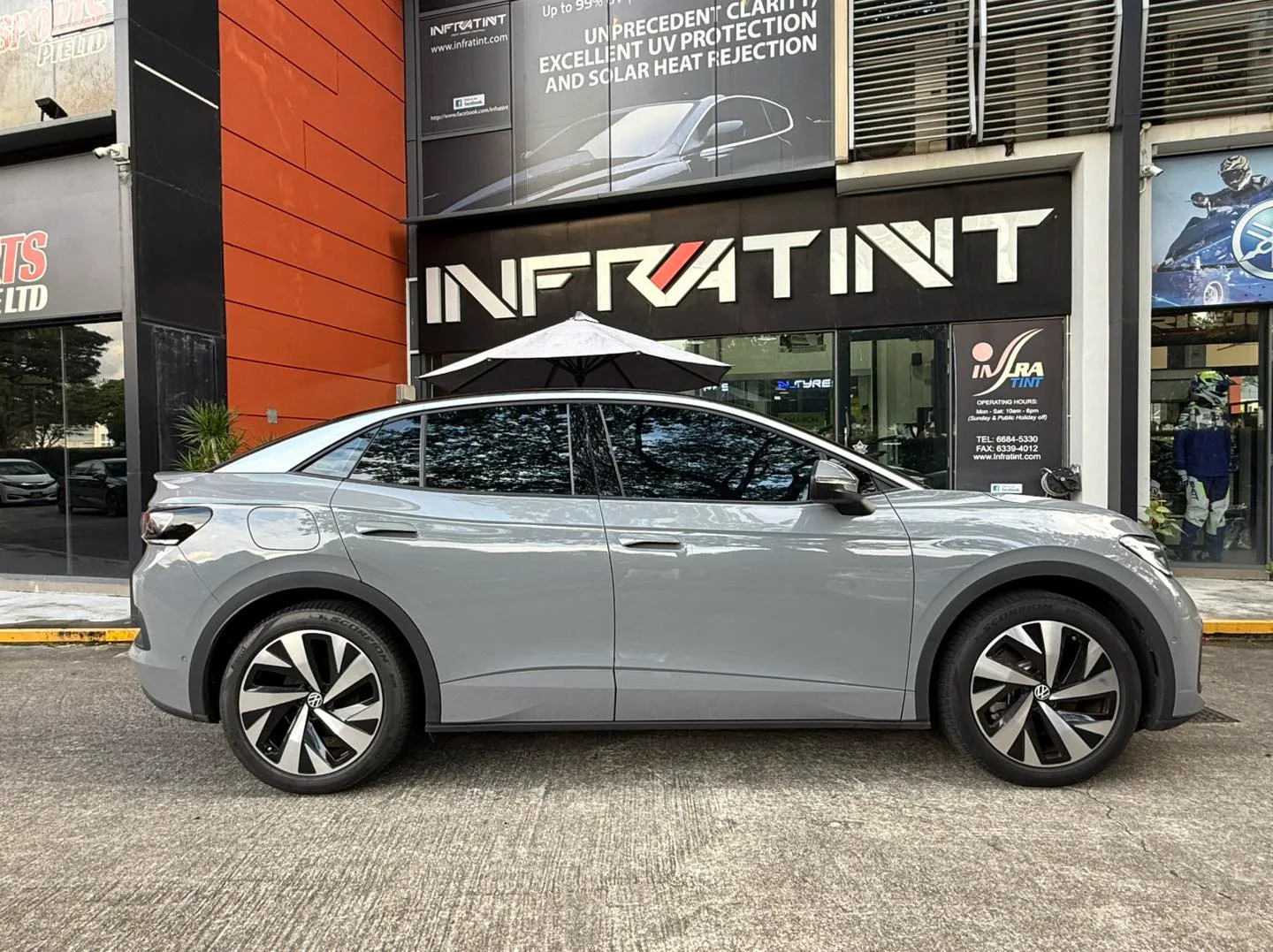 Grey Volkswagen ID.5 side profile with tinted windows at Infratint Singapore