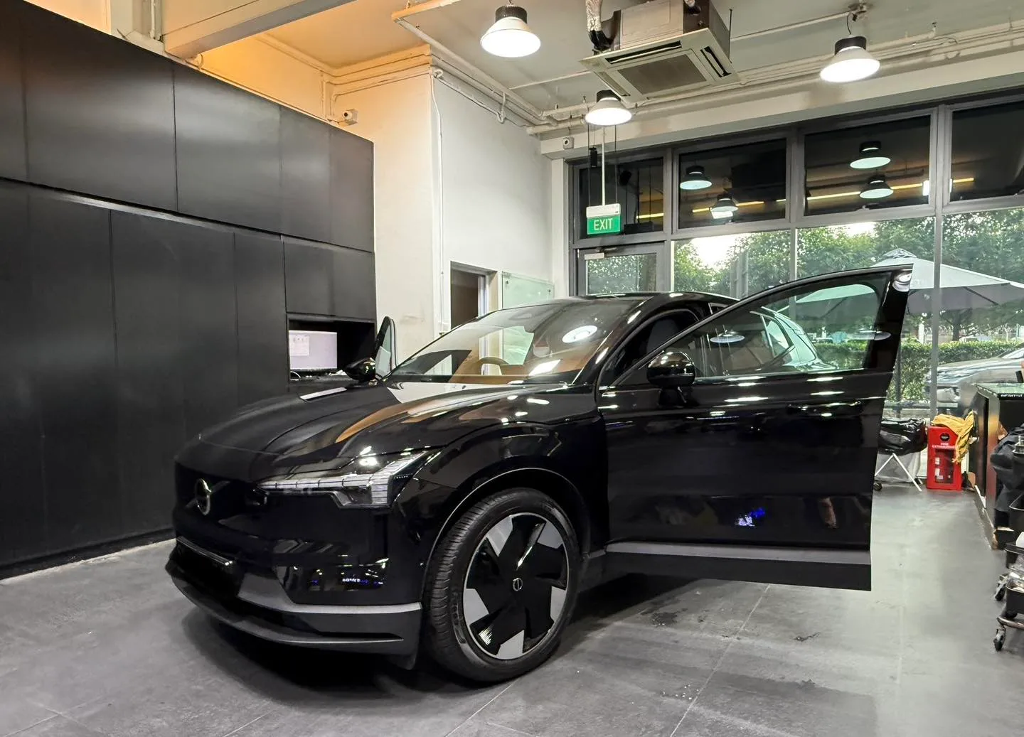 Volvo EX30 mid-install at Infratint with the front door open