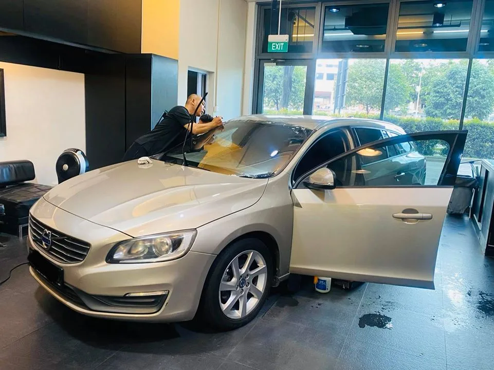 Champagne gold Volvo having windscreen film fitted at Infratint Singapore