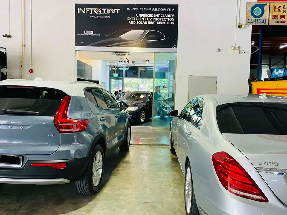 Light blue Volvo XC40 and silver Mercedes-Benz S-Class at Infratint Singapore