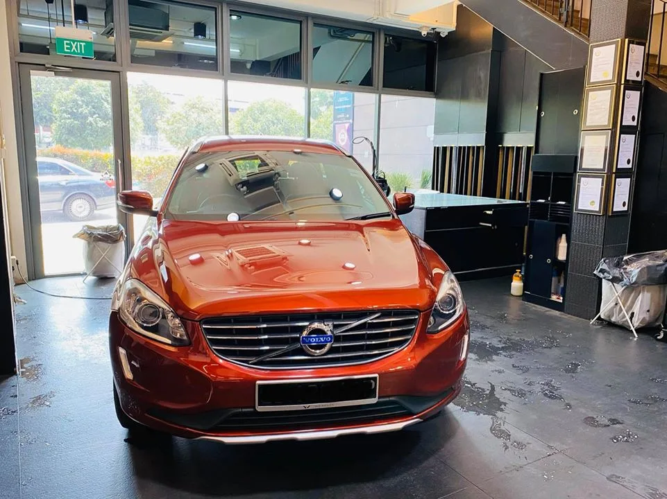 Copper-orange Volvo XC60 front view at Infratint Singapore for window tinting
